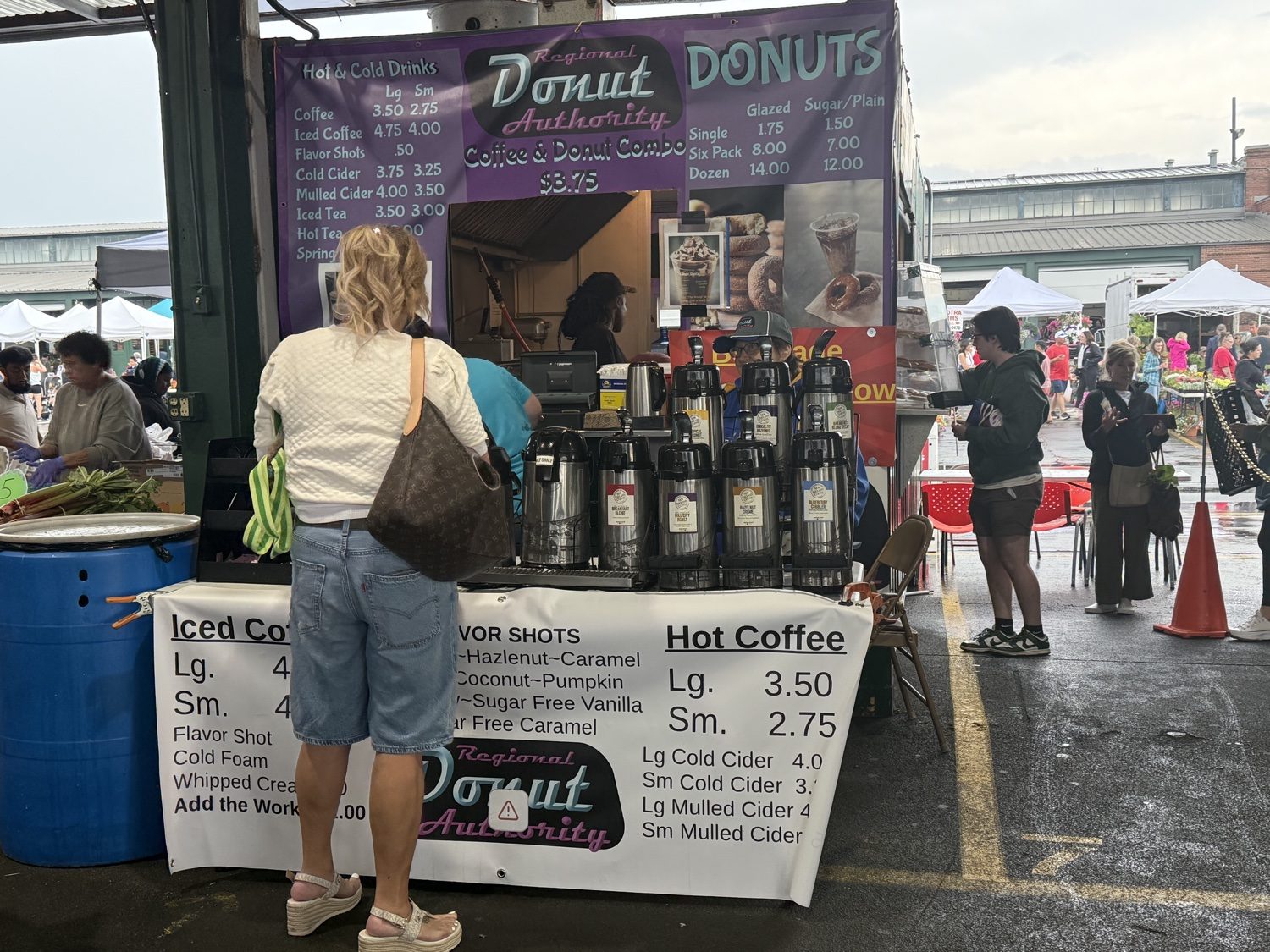 The stand with the purple menu board